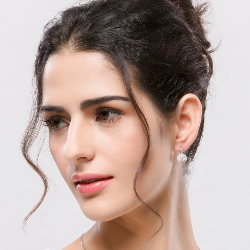 NASSARIUS KOLCZYKI CZ SWAROVSKI Srebro CYRKONIA Marka Inna marka