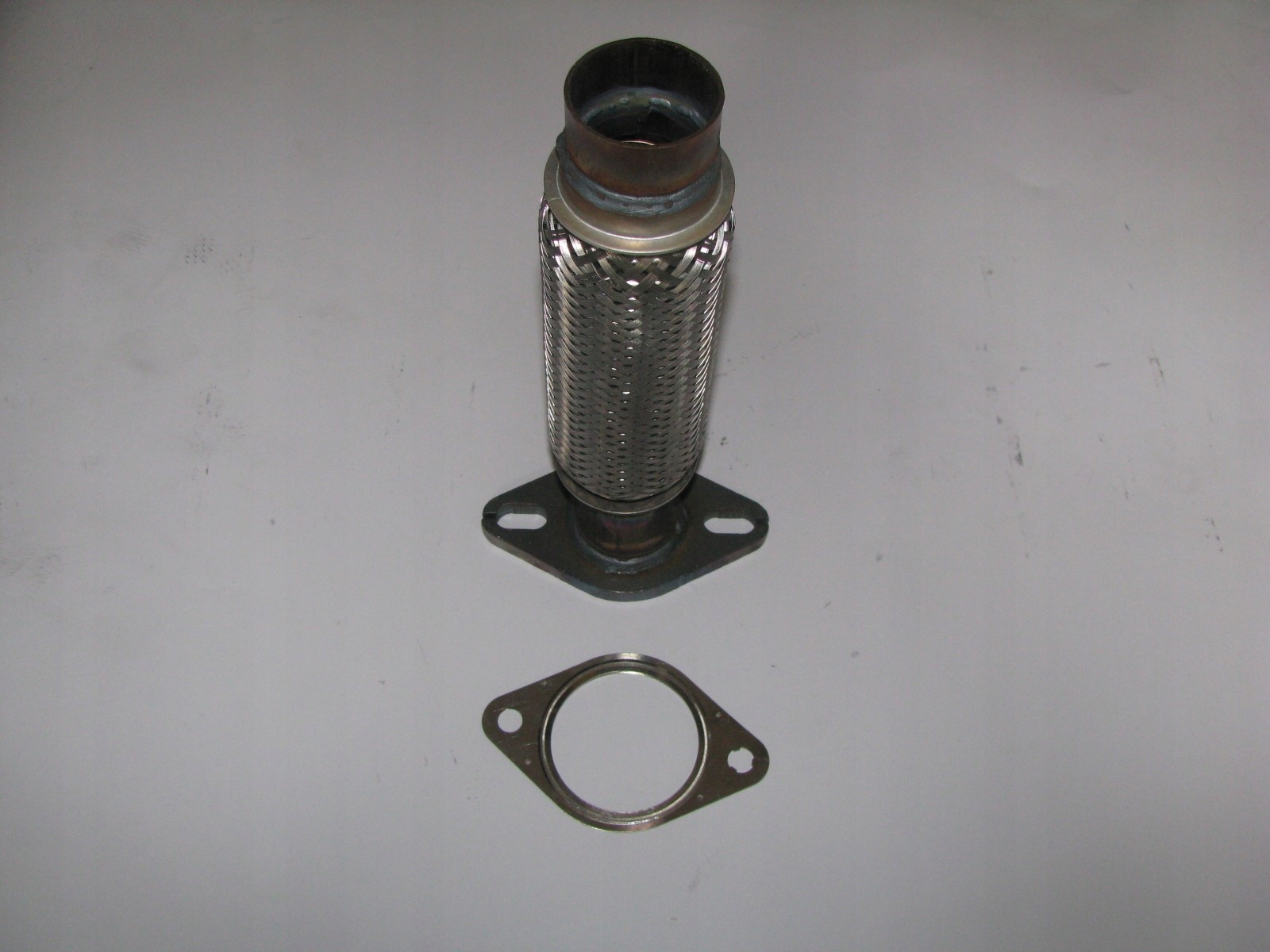 08.zł.focus - Зв'язок elast. Ford Focus MK1 1,4+1,6 + прокладка