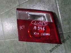 фонарь kia CARENS 2 II 02-06 в крышке багажника левый