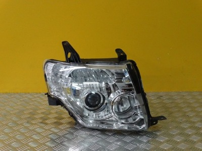 Mitsubishi pajero 2007- фара лампа правая eu фото №1