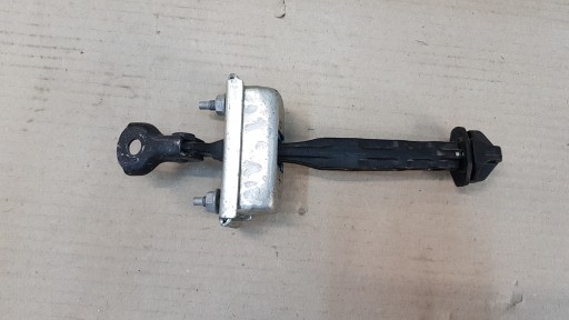 Opel Astra J IV ogranicznik drzwi tył