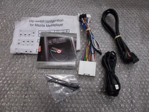 MAZDA 2 6 адаптер РОЗ'ЄМ IPOD новий! Оригінал!