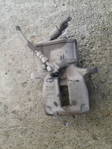 ЗАТИСКАЧ ПРАВИЙ ЗАДНІЙ VW TIGUAN І 5N0