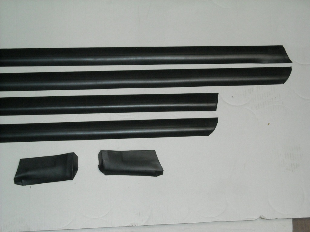 фото №5, Nowe накладки резиновые нижние na дверь audi 100 c4 a6 4 szt. +короткие крыло